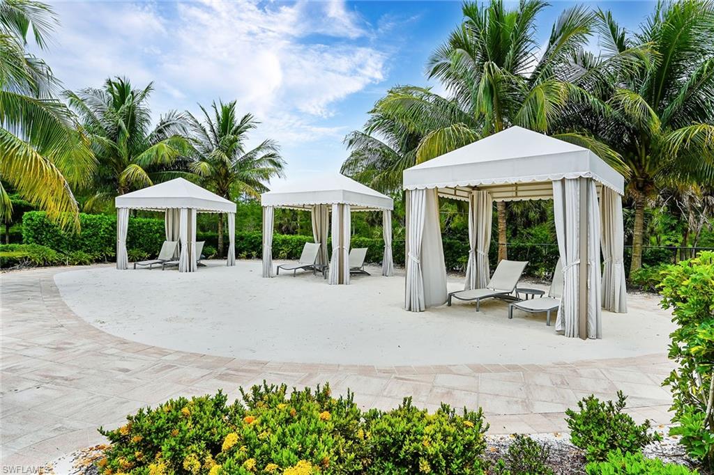 7638 Jacaranda Lane Naples, FL 34114 - Photo 39 of 50 a house with a garden space