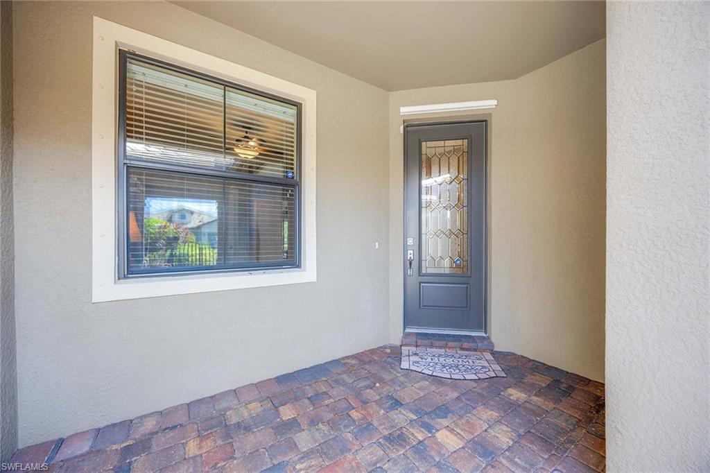 7638 Jacaranda Lane Naples, FL 34114 - Photo 8 of 50 a view of an empty room and window