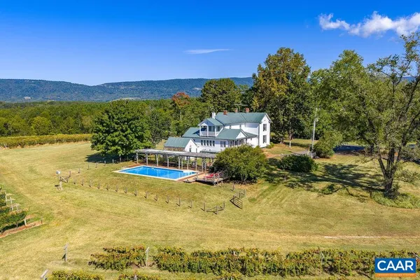 a view of an ocean with a mountain