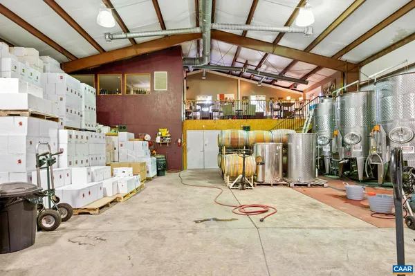 a kitchen with a sink and a large window
