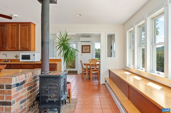 a bathroom with a sink a mirror and a shower