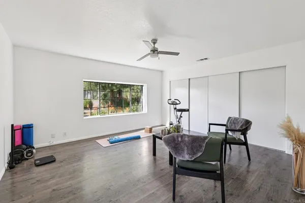 a living room with furniture and a table
