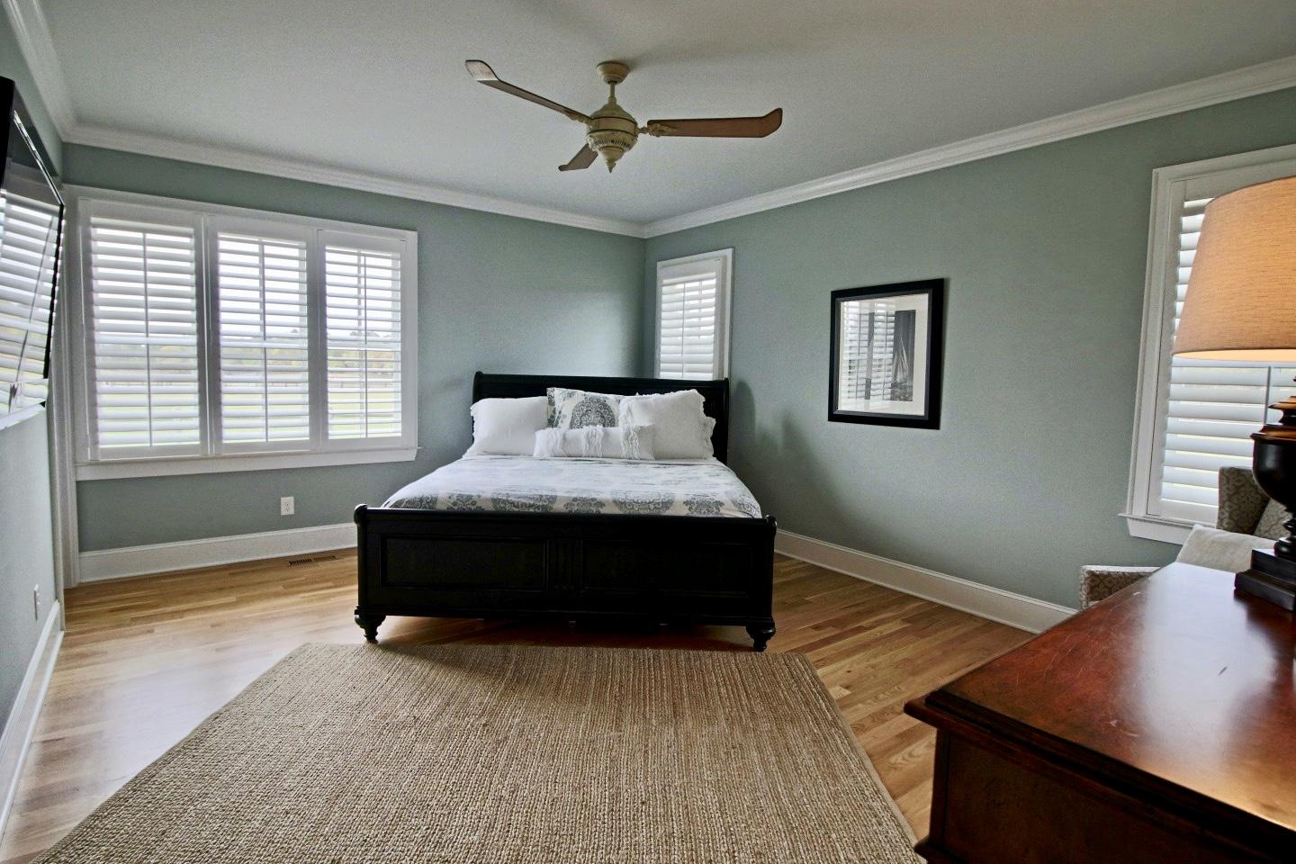 401 Youngs Road Vass, NC 28394 - Photo 19 of 33 The split bedroom plan offers an oversized Master Bedroom with a walk-in closet and a gorgeous bath with carrara marble counters, floors and walk-in shower.