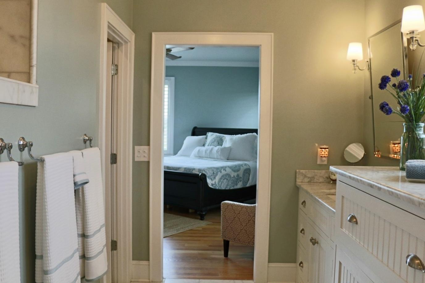 401 Youngs Road Vass, NC 28394 - Photo 20 of 33 The split bedroom plan offers an oversized Master Bedroom with a walk-in closet and a gorgeous bath with carrara marble counters, floors and walk-in shower.