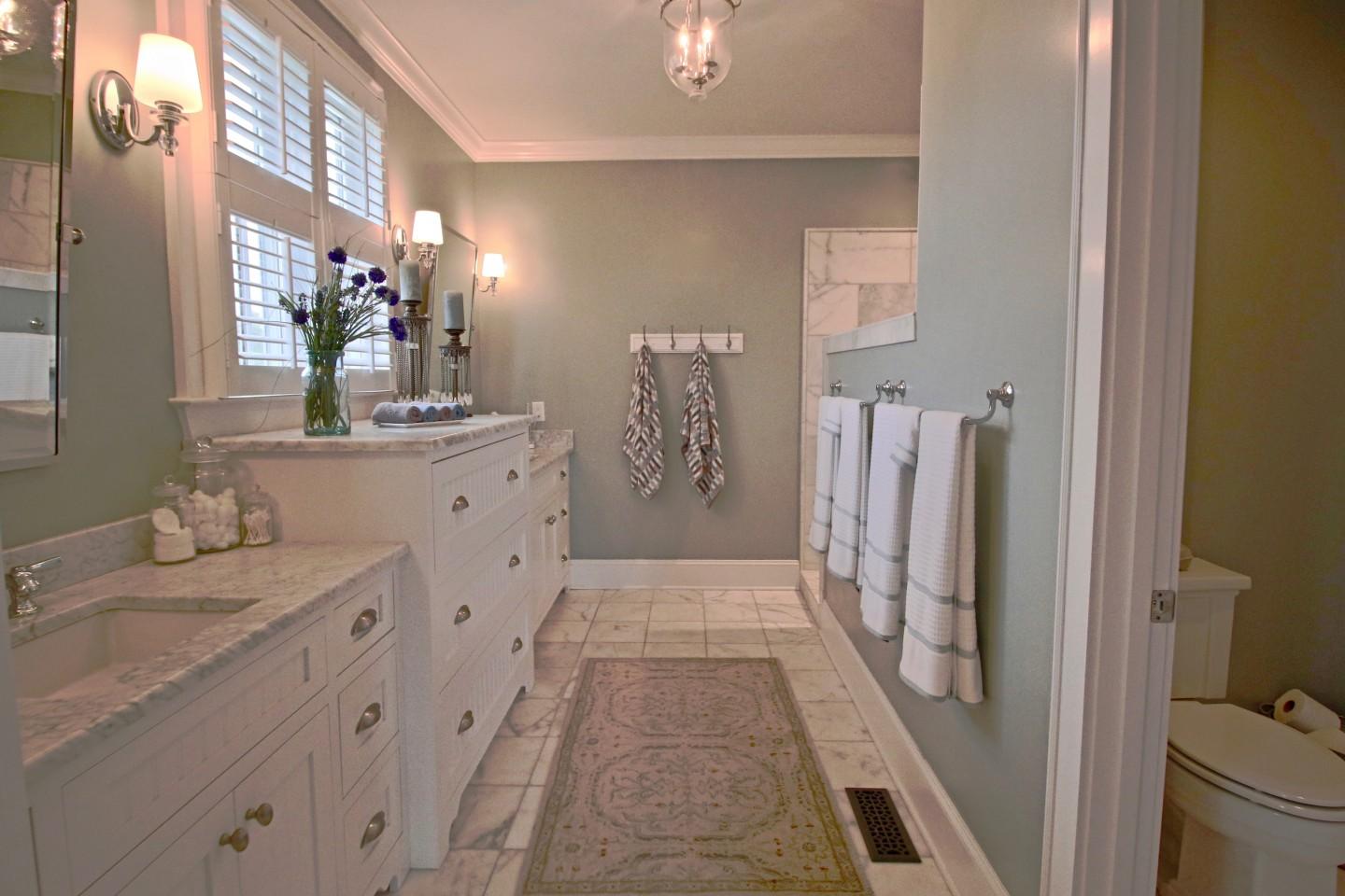 401 Youngs Road Vass, NC 28394 - Photo 21 of 33 The split bedroom plan offers an oversized Master Bedroom with a walk-in closet and a gorgeous bath with carrara marble counters, floors and walk-in shower.