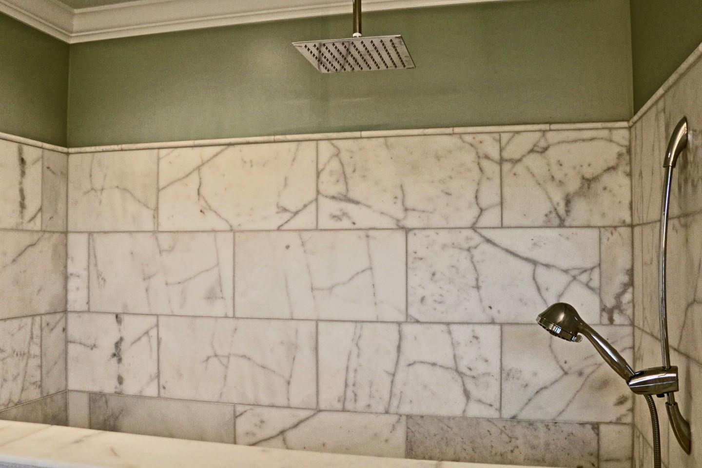 401 Youngs Road Vass, NC 28394 - Photo 23 of 33 The split bedroom plan offers an oversized Master Bedroom with a walk-in closet and a gorgeous bath with carrara marble counters, floors and walk-in shower.