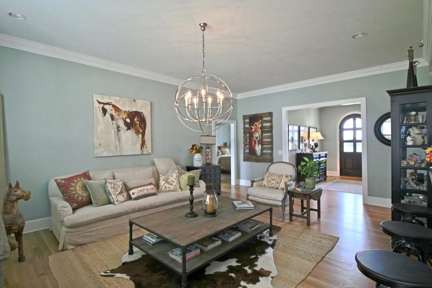401 Youngs Road Vass, NC 28394 - Photo 5 of 33 This spacious living room opens up to the kitchen - a perfect space for entertaining !