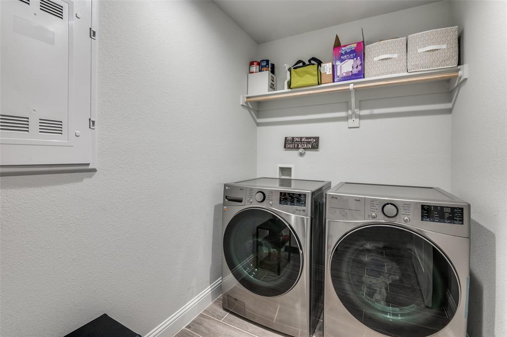 1216 Collett Sublett Road Kennedale, TX 76060 - Photo 16 of 25 a utility room with dryer and washer