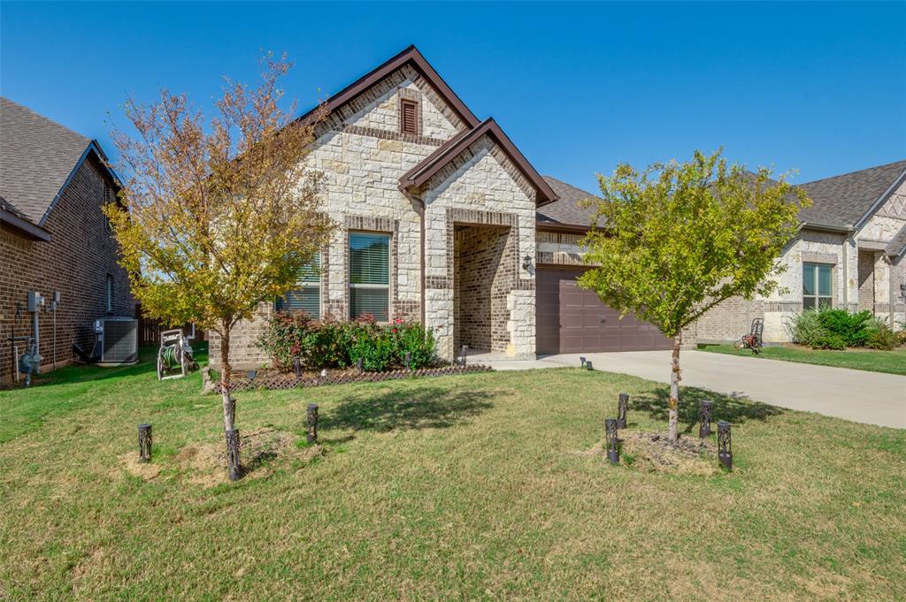 1216 Collett Sublett Road Kennedale, TX 76060 - Photo 2 of 25 a front view of a house with a yard