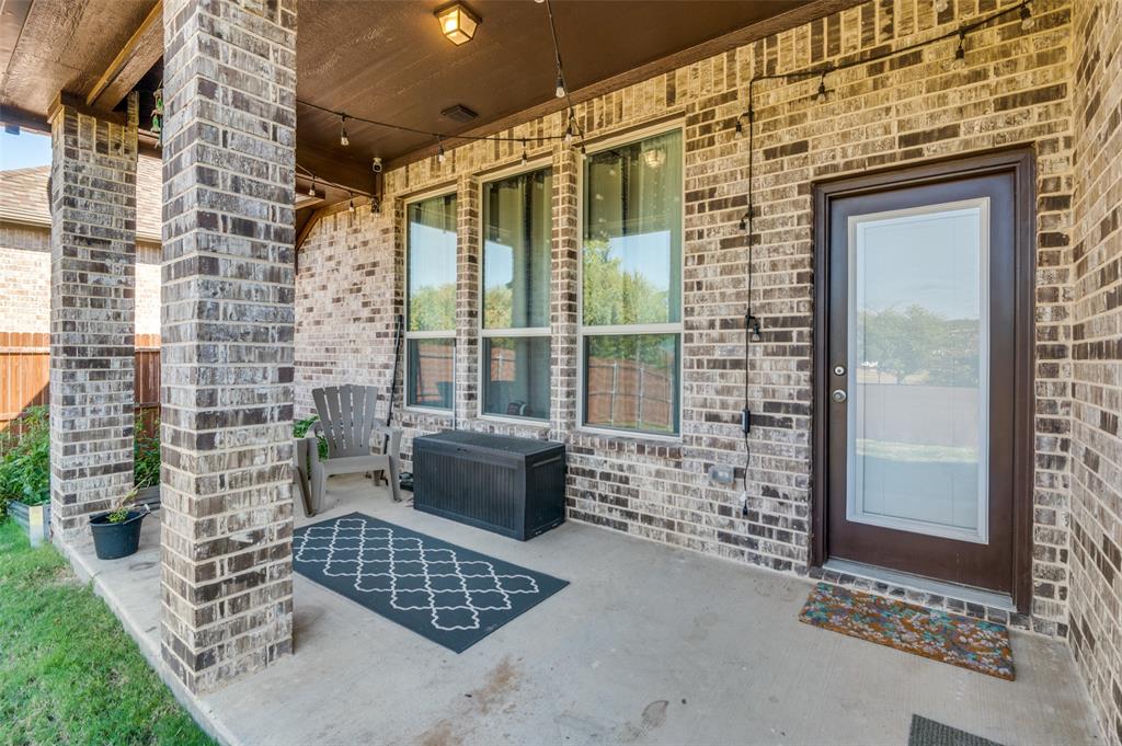 1216 Collett Sublett Road Kennedale, TX 76060 - Photo 22 of 25 view of outdoor space with porch