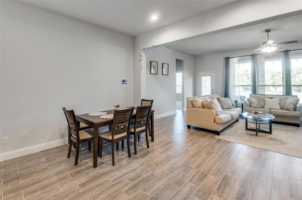 1216 Collett Sublett Road Kennedale, TX 76060 - Photo 8 of 25 a living room with furniture and a wooden floor