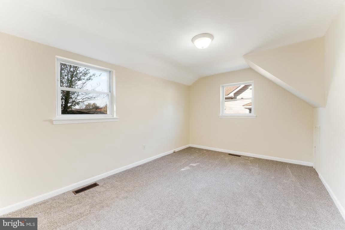 2504 Weisman Road Silver Spring, MD 20902 - Photo 13 of 30 an empty room with windows