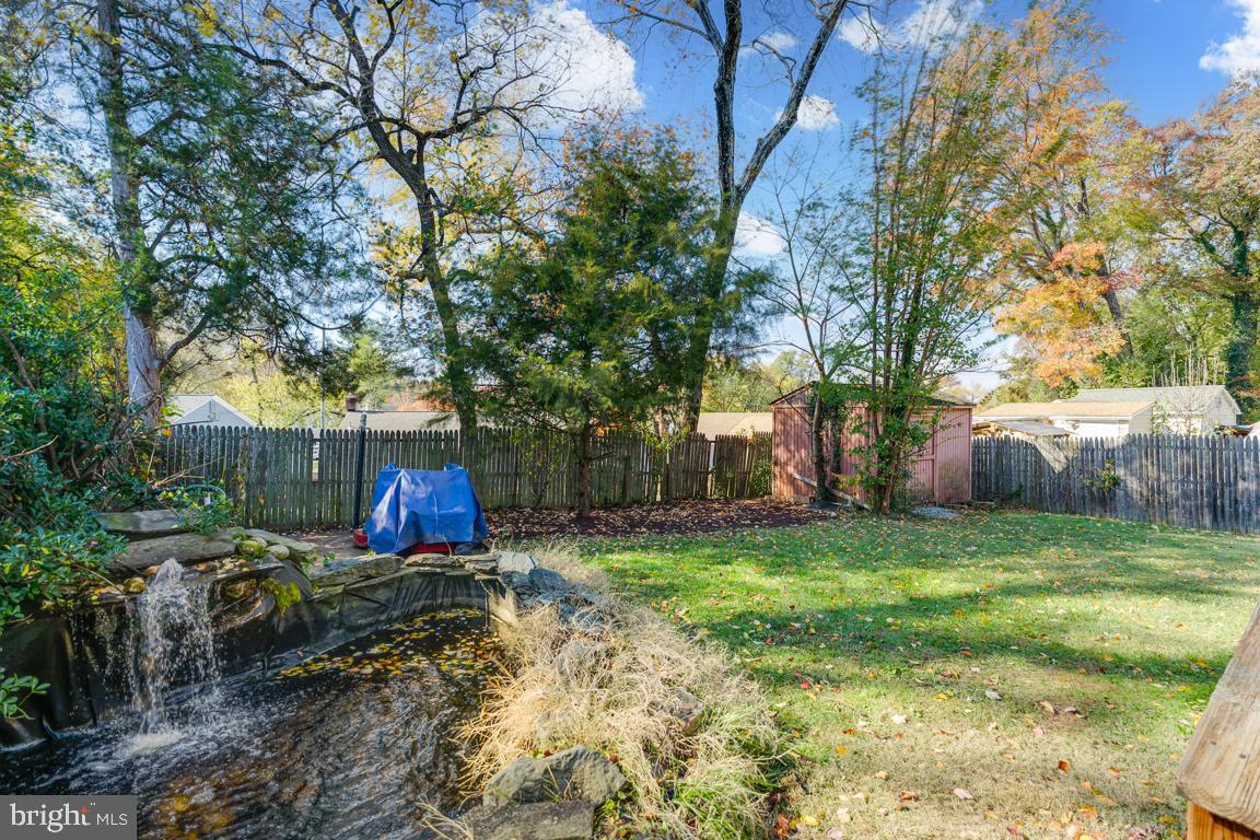 2504 Weisman Road Silver Spring, MD 20902 - Photo 26 of 30 a view of a backyard with trees