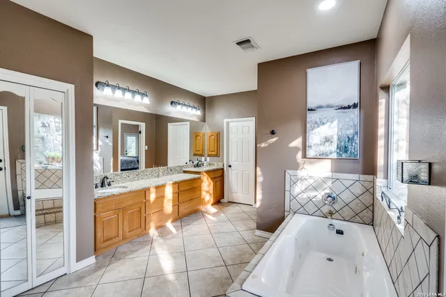 a utility room with a sink a washer and dryer