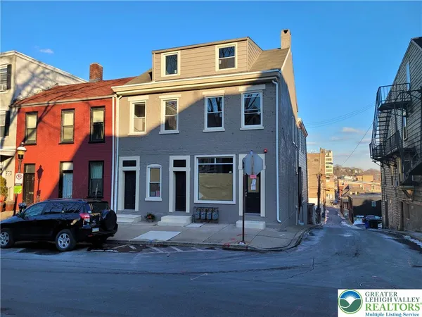 a view of a car park in front of a building