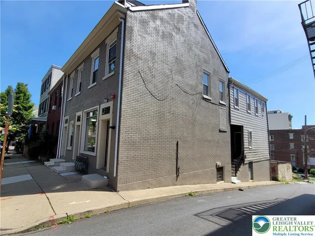 a brick building with a large windows