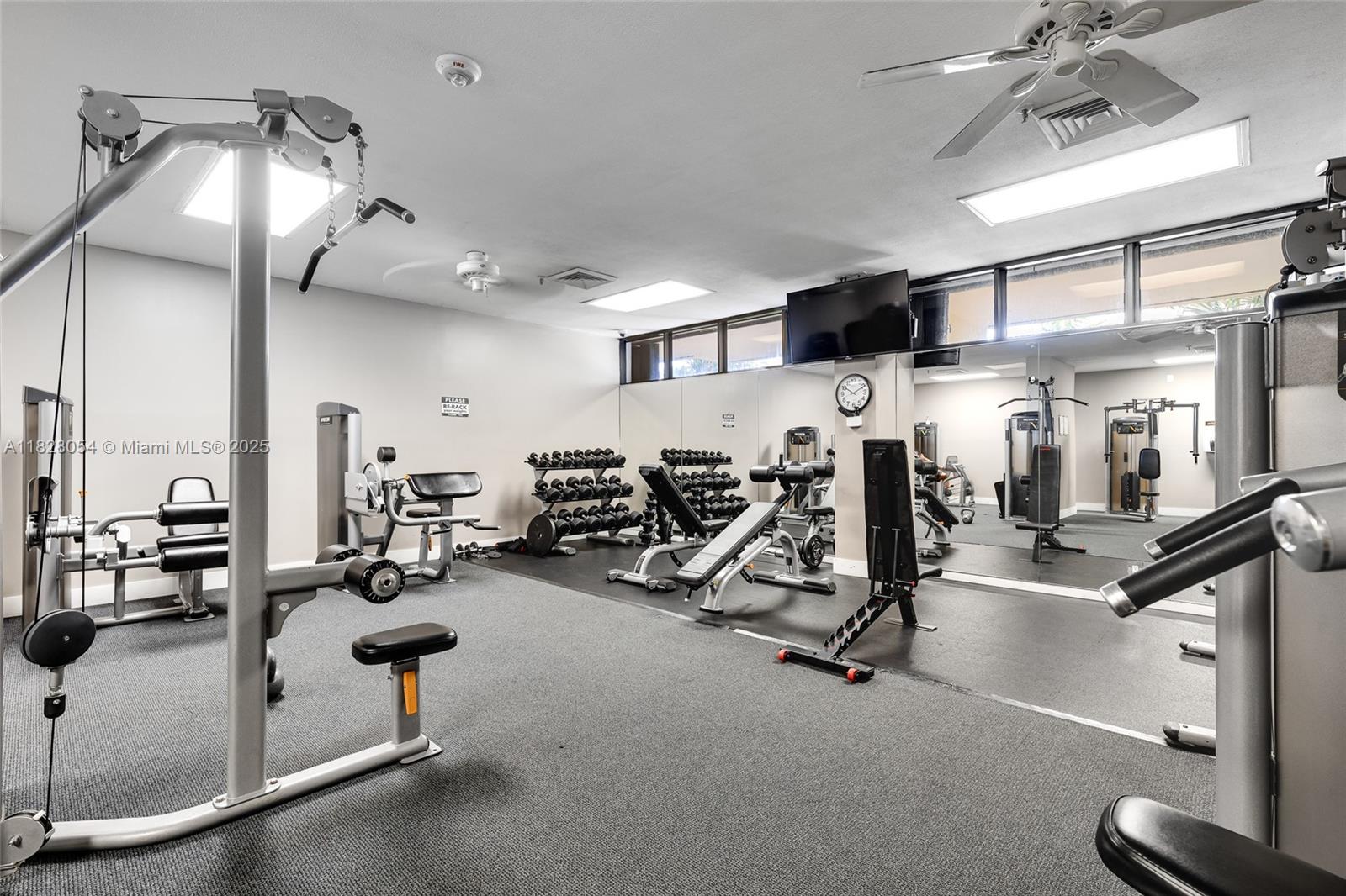 520 Brickell Key Drive, Unit A1817 Miami, FL 33131 - Photo 17 of 20 a view of a room with gym equipment