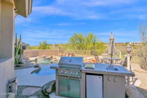 a view of an chairs and tables in patio