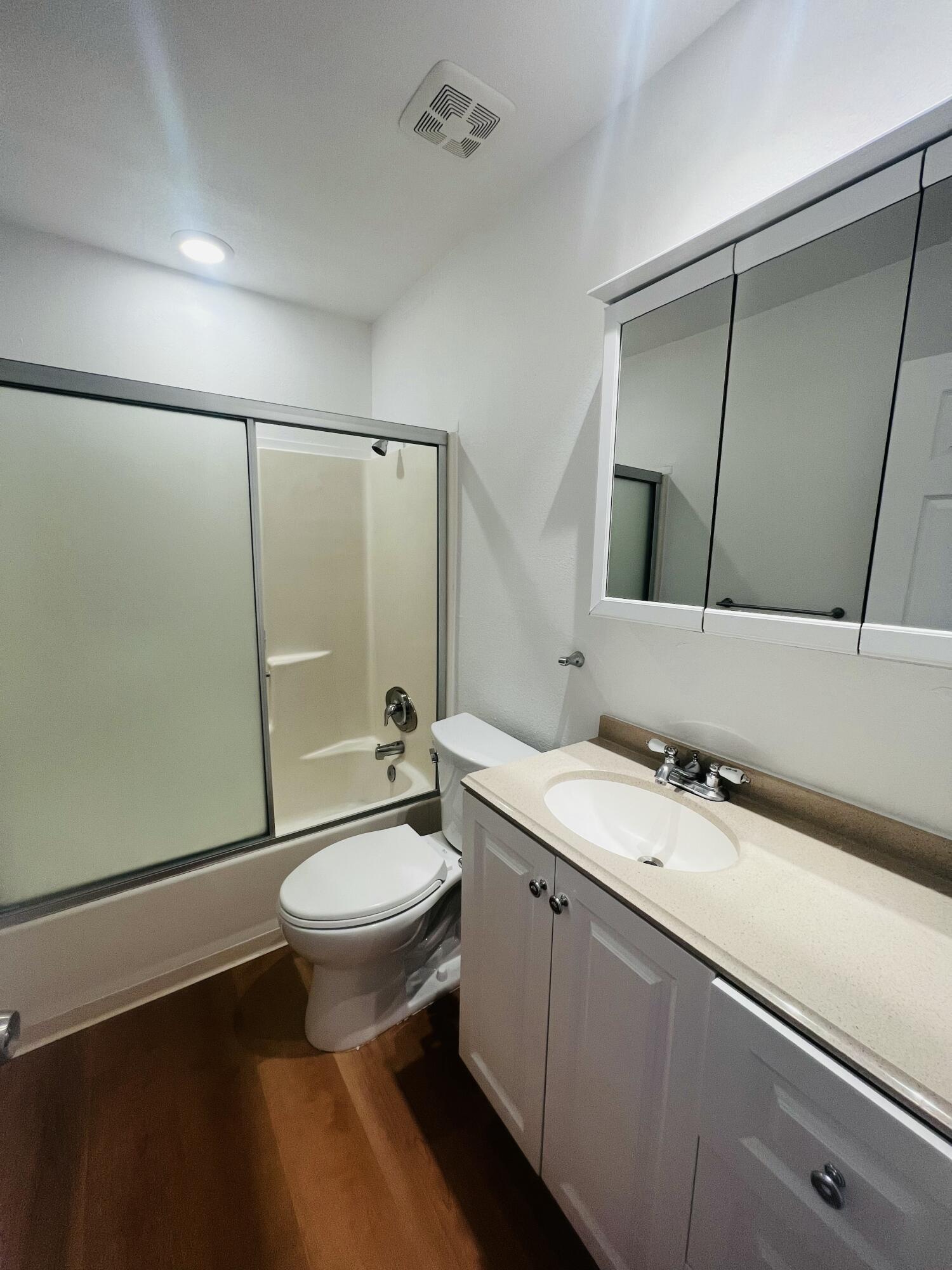 32900 Monte Vista Road Cathedral City, CA 92234 - Photo 13 of 18 a bathroom with a sink a toilet and shower