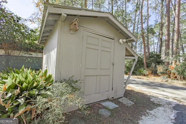 a spacious bathroom with a double vanity sink mirror double and shower