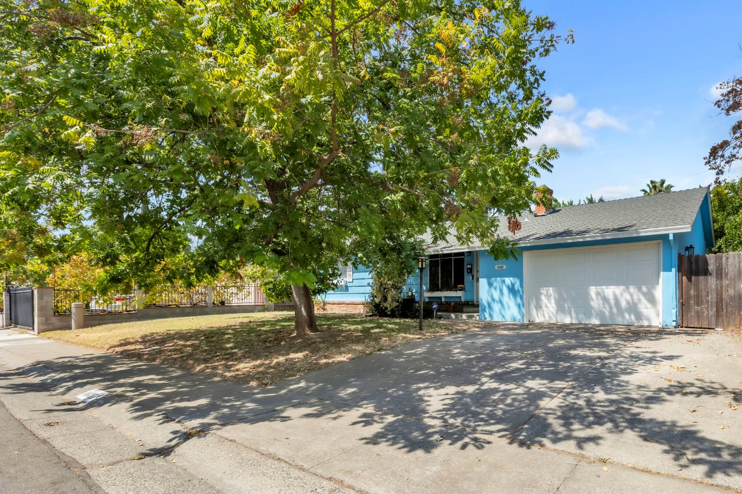 10357 Daniel Way Rancho Cordova, CA 95670 - Photo 1 of 1 a front view of a house with a tree