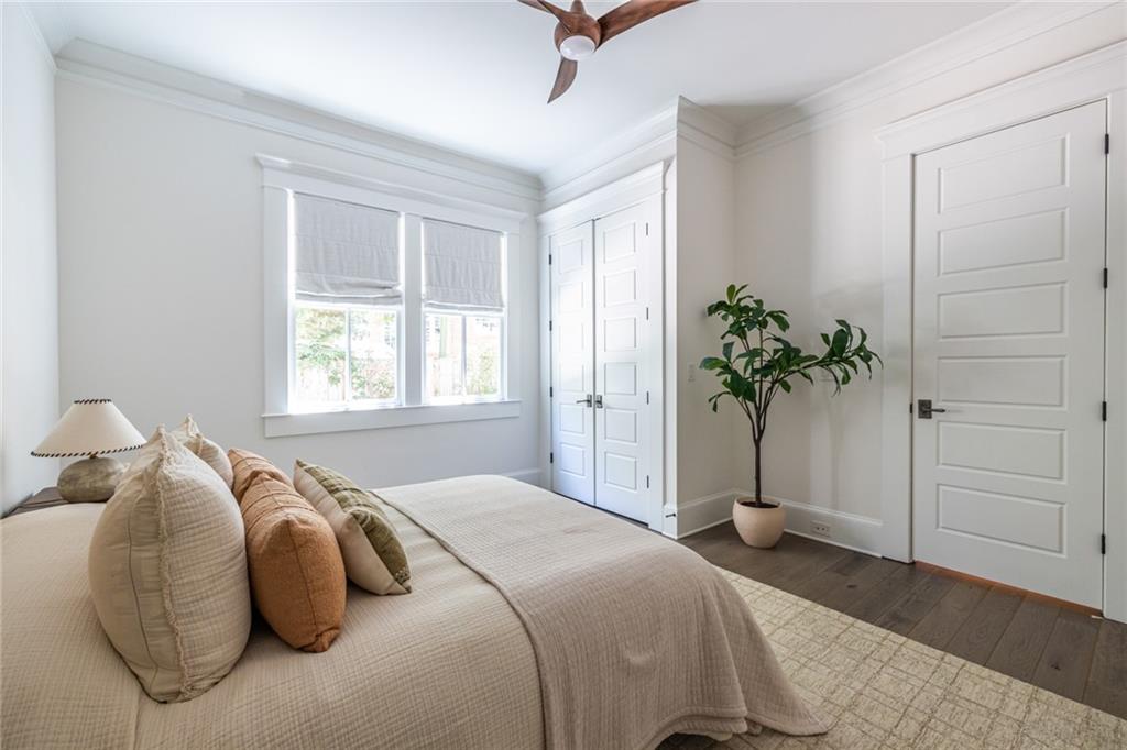 538 Ansley Street Decatur, GA 30030 - Photo 25 of 73 a bedroom with a bed and a potted plant