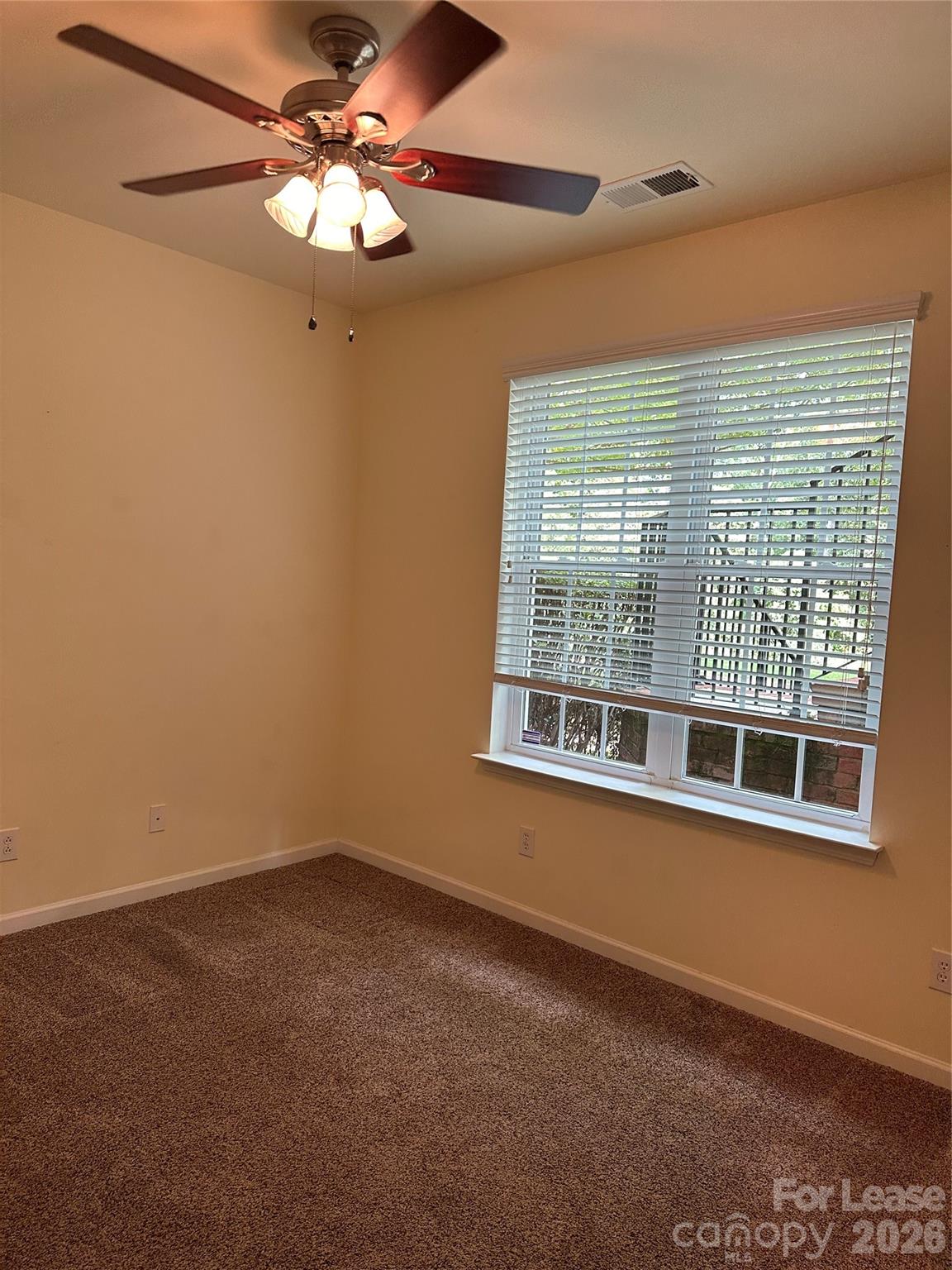 1104 Drayton Court Fort Mill, SC 29708 - Photo 17 of 20 a view of an empty room with a window