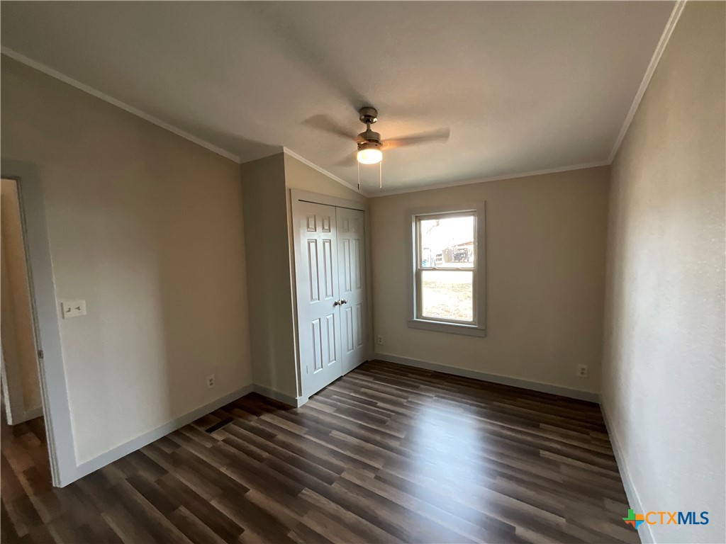 2301 Sumac Lane Cedar Park, TX 78613 - Photo 12 of 26 a view of an empty room window and wooden floor