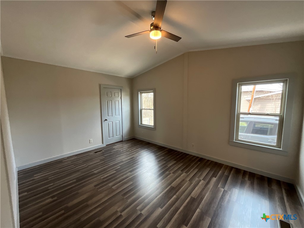 2301 Sumac Lane Cedar Park, TX 78613 - Photo 20 of 26 a view of empty room with wooden floor and fan