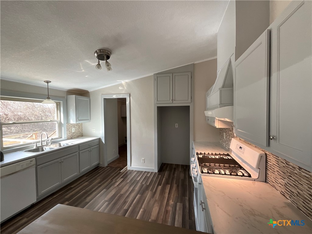 2301 Sumac Lane Cedar Park, TX 78613 - Photo 25 of 26 a large white kitchen with a large window