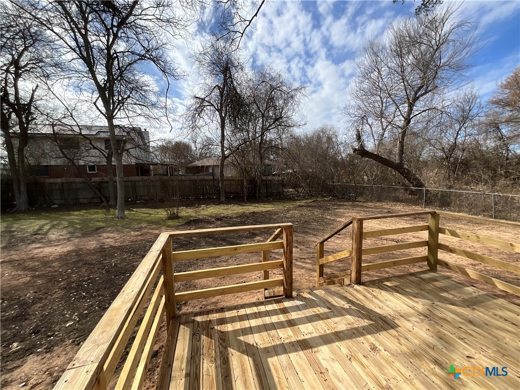 2301 Sumac Lane Cedar Park, TX 78613 - Photo 10 of 26 a view of backyard with wooden fence and large trees