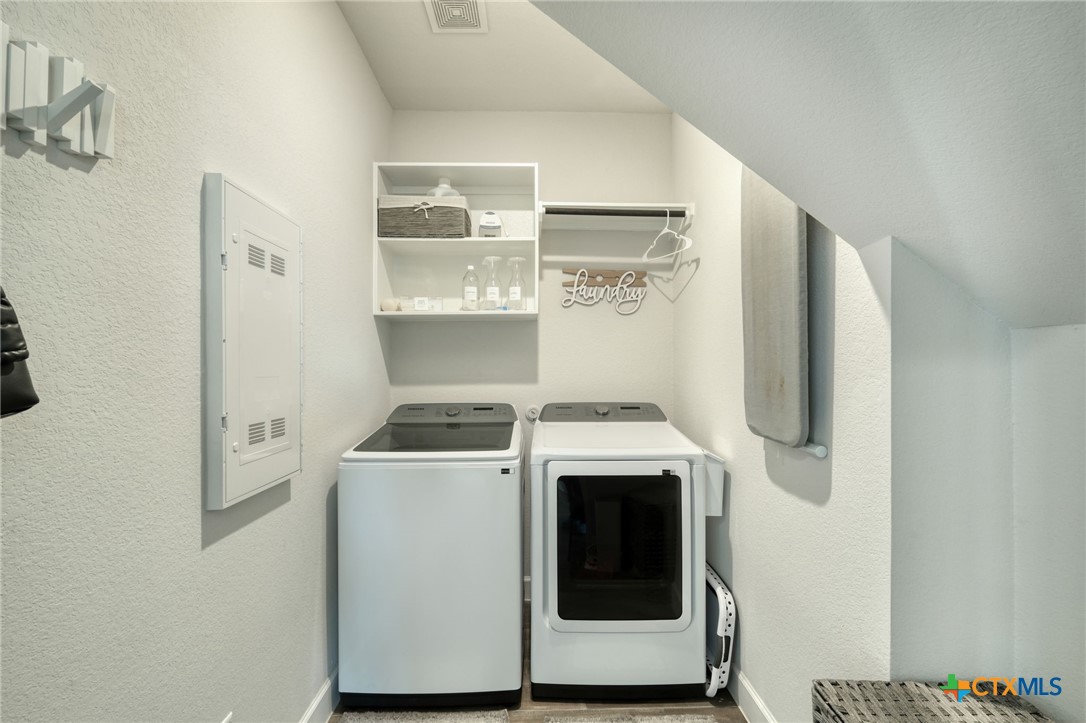 1401 Mulberry Oak Lane Georgetown, TX 78628 - Photo 26 of 30 Laundry area located on the first floor, featuring washing machine and dryer