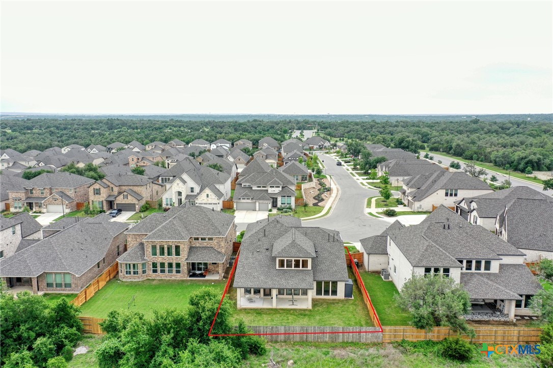 1401 Mulberry Oak Lane Georgetown, TX 78628 - Photo 26 of 29 an aerial view of residential houses with outdoor space and trees