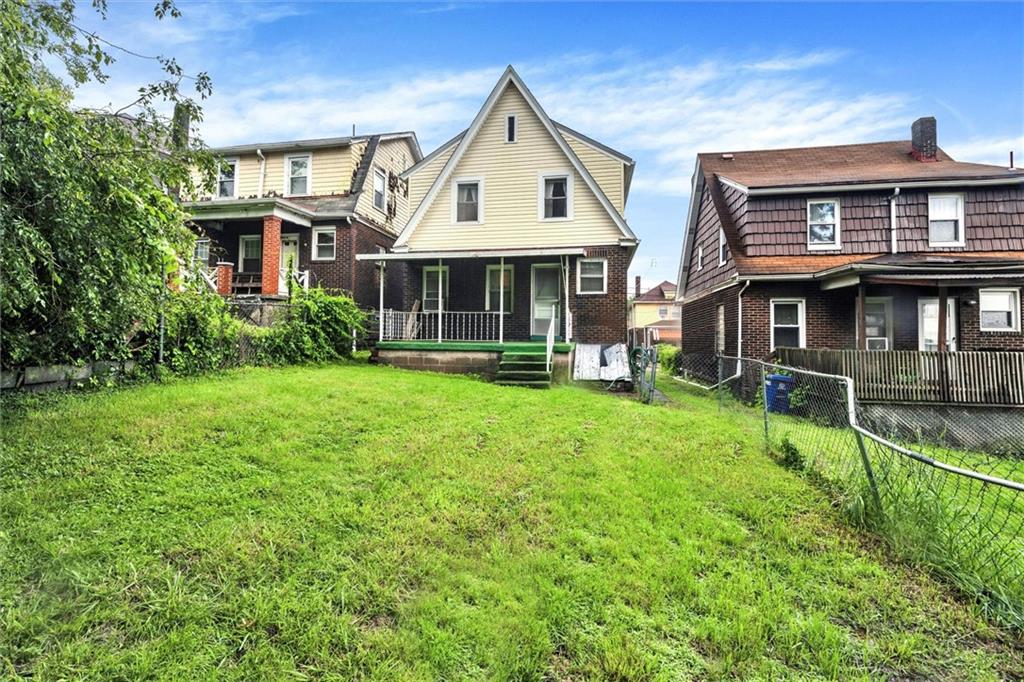2606 Belmar Place Pittsburgh, PA 15218 - Photo 17 of 18 front view of a house with a yard