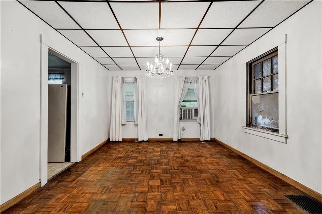 2606 Belmar Place Pittsburgh, PA 15218 - Photo 5 of 18 a view of a room with a chandelier