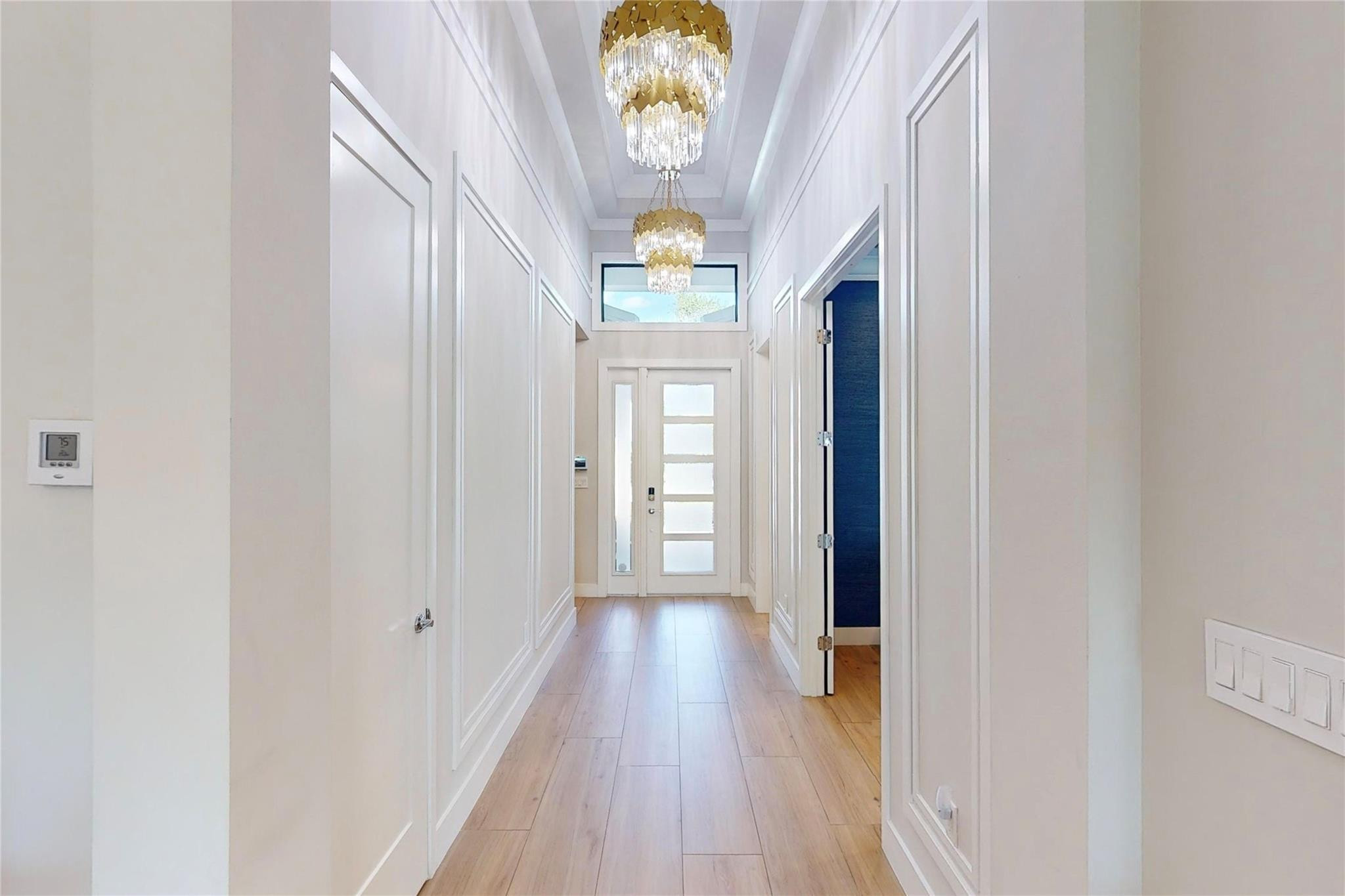 17273 Windy Pointe Lane Boca Raton, FL 33496 - Photo 4 of 56 Entry Hall wainscoting details on walls