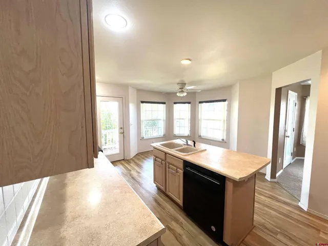 a kitchen with a stove and a sink