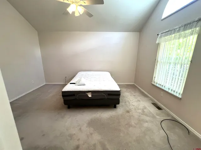 a bathroom with a sink and a chandelier