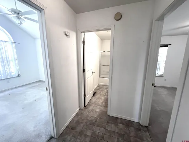 view of a bathroom with a glass door shower
