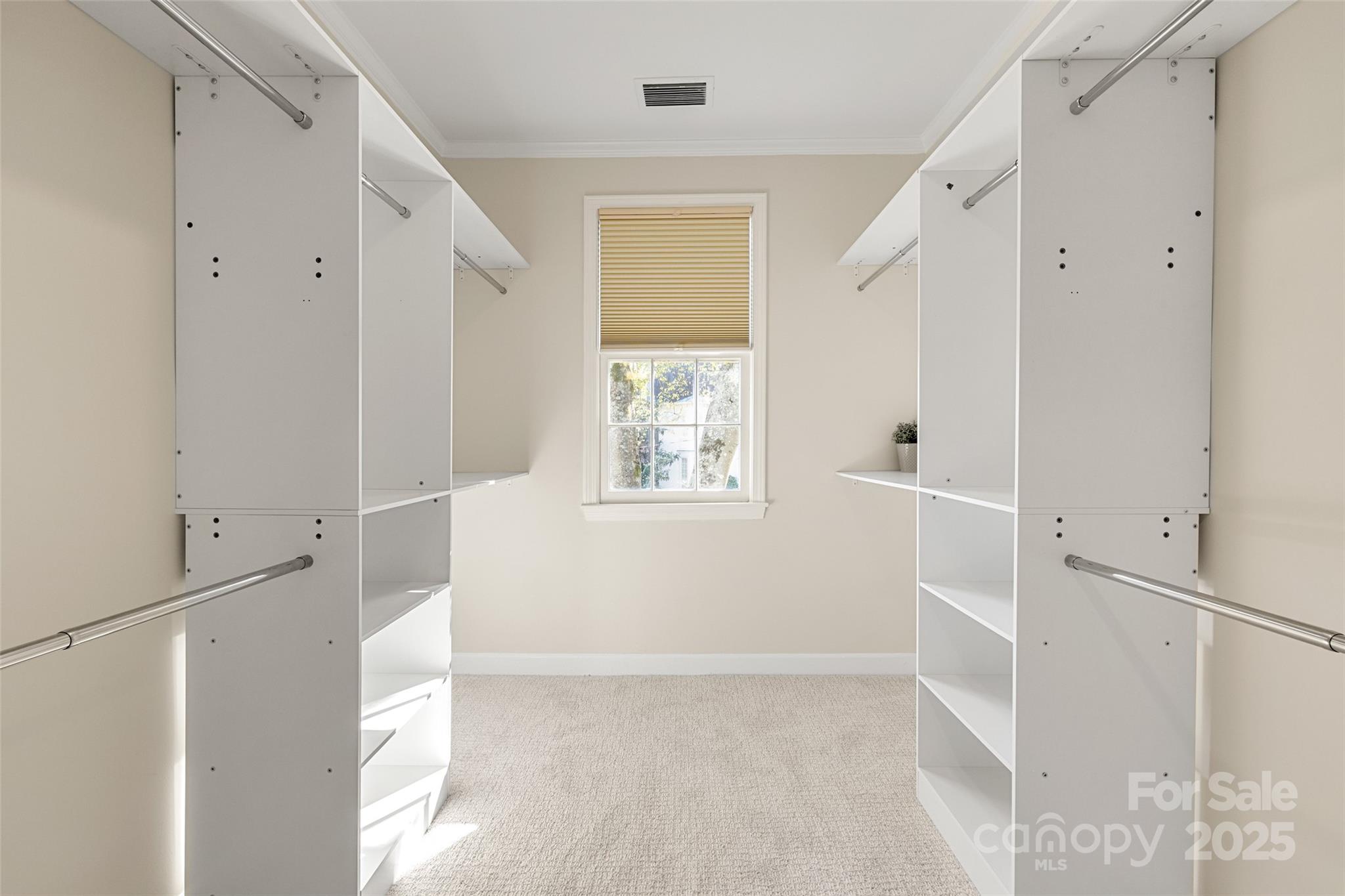 153 Perrin Place, Unit 153 Charlotte, NC 28207 - Photo 20 of 28 a view of an empty room with a window