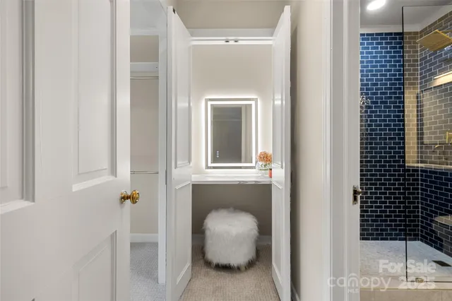 a bathroom with a sink and mirror