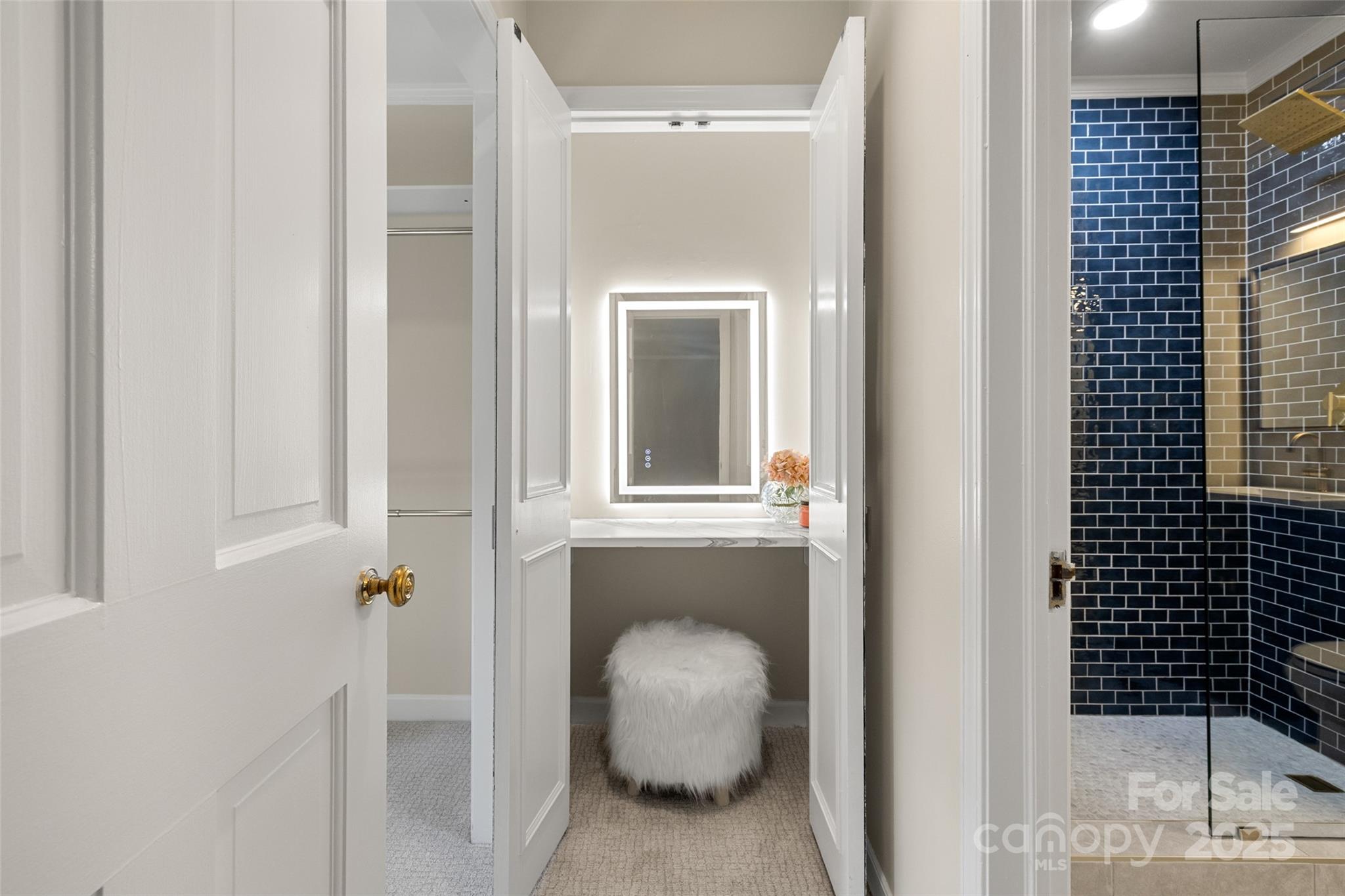 153 Perrin Place, Unit 153 Charlotte, NC 28207 - Photo 21 of 28 a bathroom with a sink and mirror