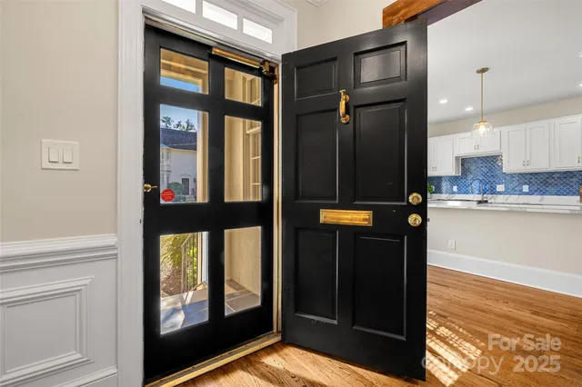 a view of a living room with a large window
