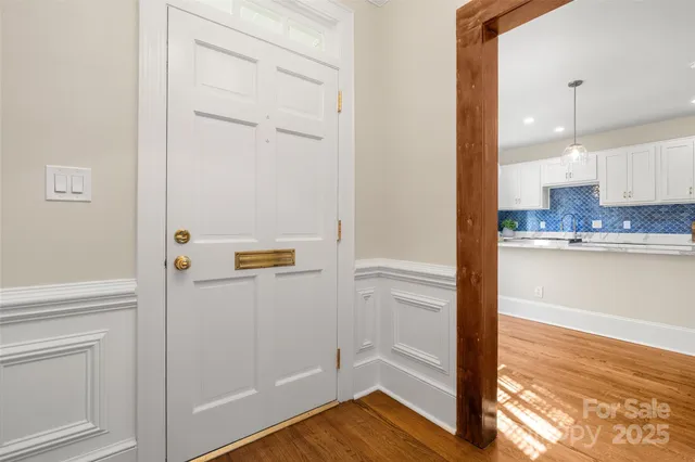 a view of kitchen with wooden floor
