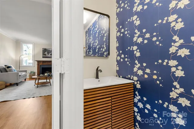 a view of a living room and entryway