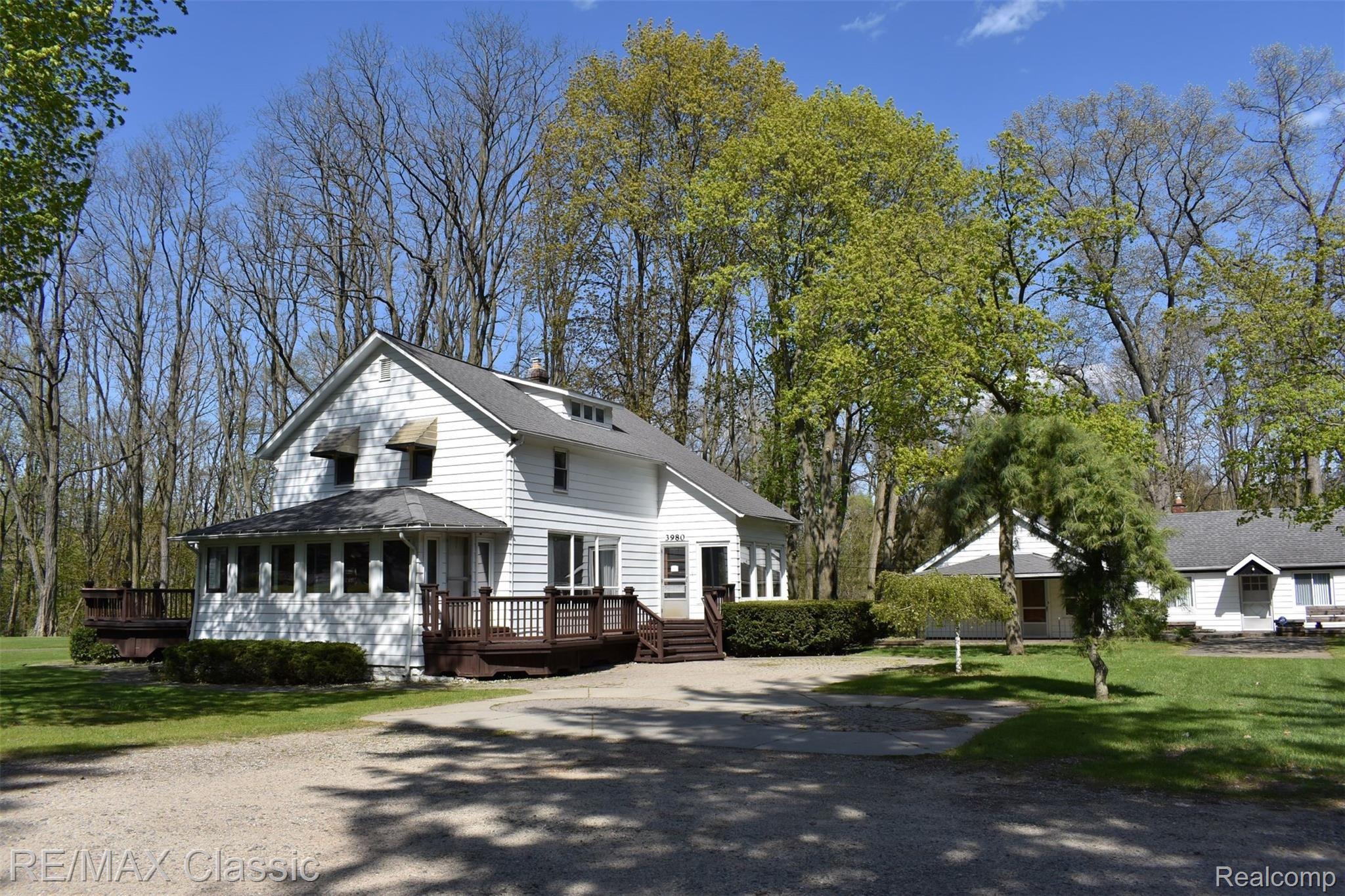 3980 Benstein Road Commerce Township, MI 48382 - Photo 2 of 68 The trees are starting to fill in:)
