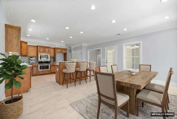 a view of a dining room with furniture