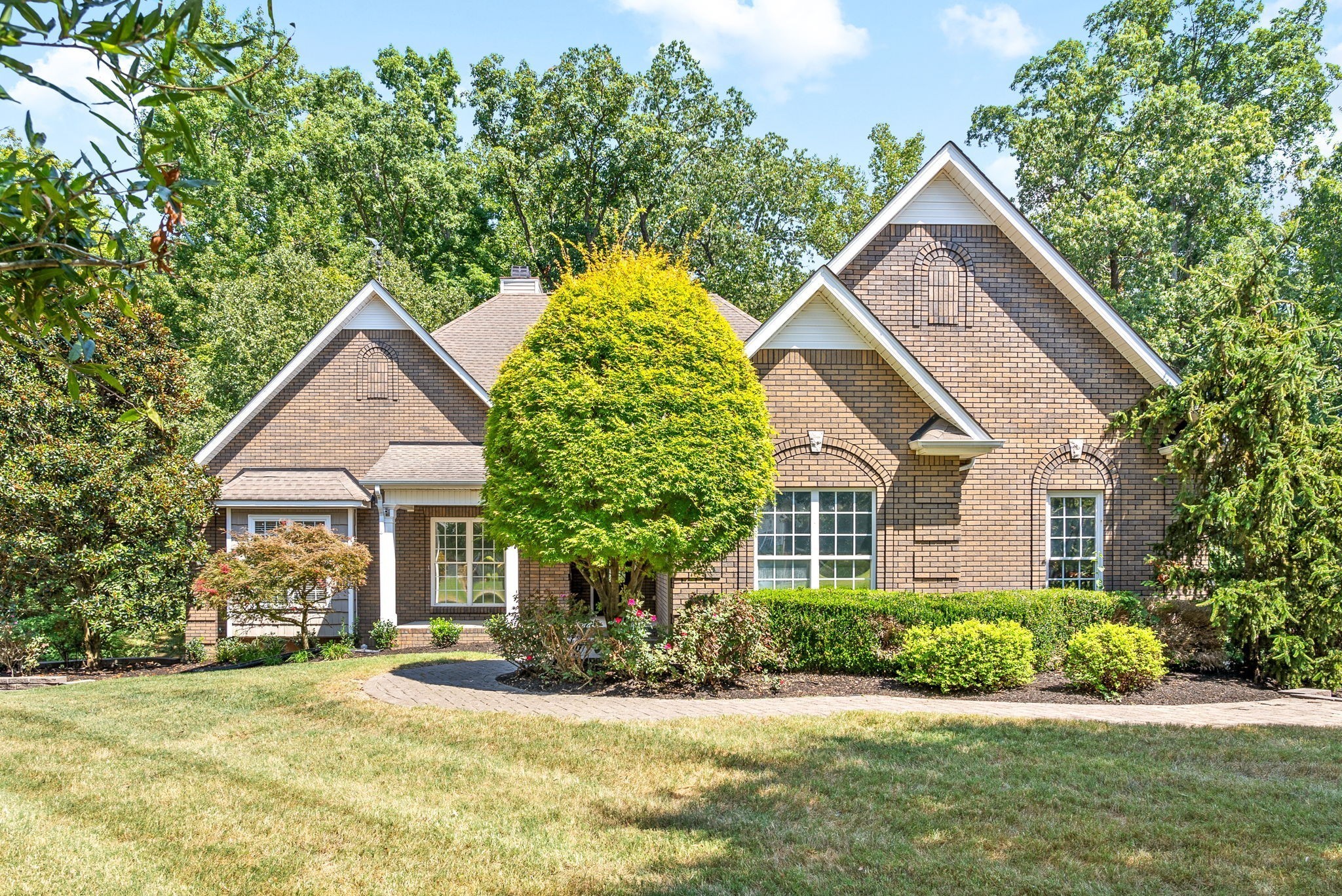 245 Cullom Way Clarksville, TN 37043 - Photo 2 of 74 a front view of a house with a yard and trees