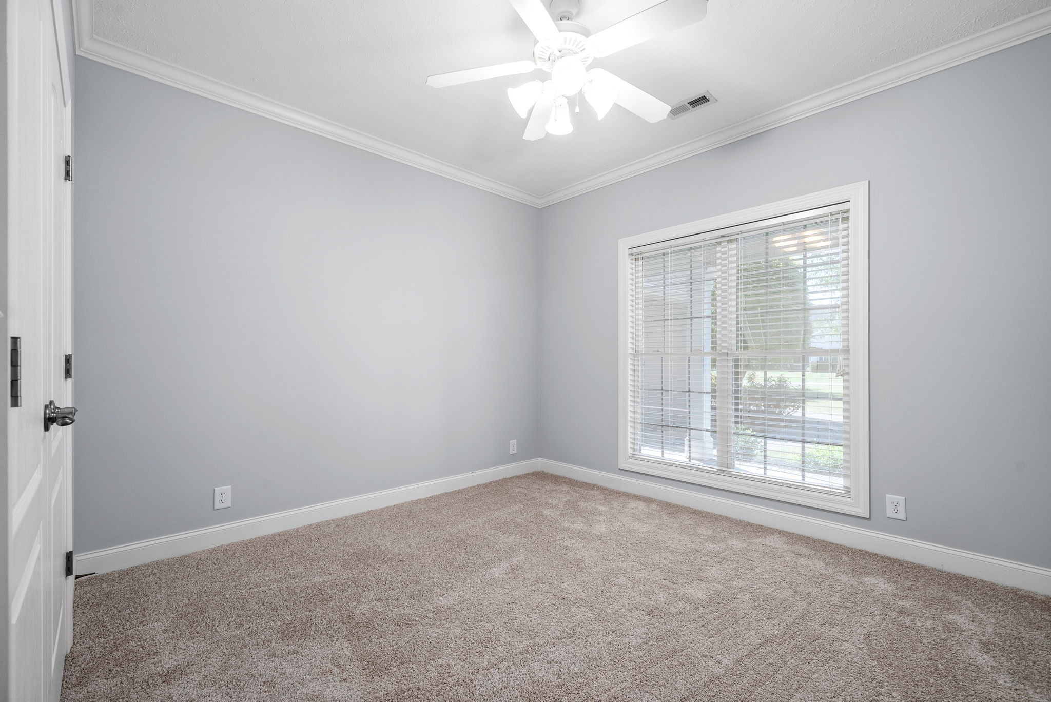 245 Cullom Way Clarksville, TN 37043 - Photo 33 of 74 an empty room with a window and a fan
