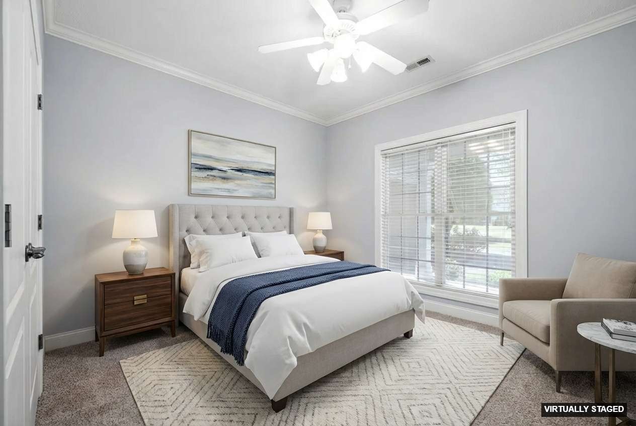 245 Cullom Way Clarksville, TN 37043 - Photo 34 of 74 a bedroom with a large bed and a couch